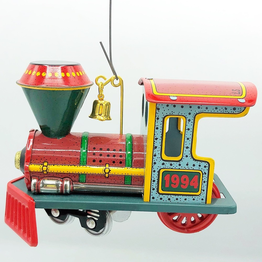 Yuletide Central #1 in ser Hallmark Ornament Tin Train 1994